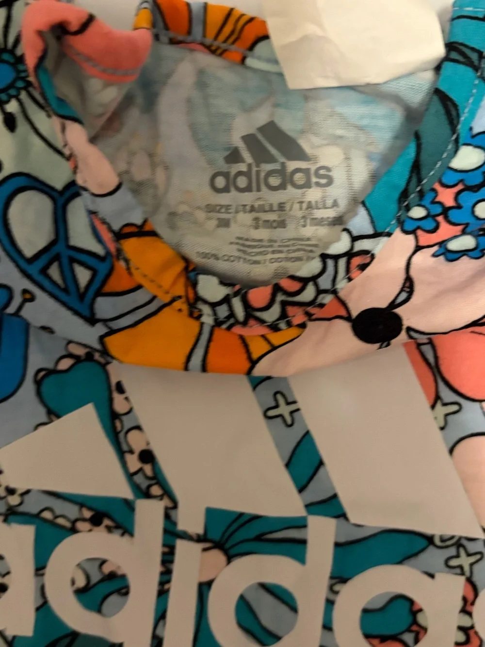 adidas Floral Logo Baby Romper in Pink and Blue
